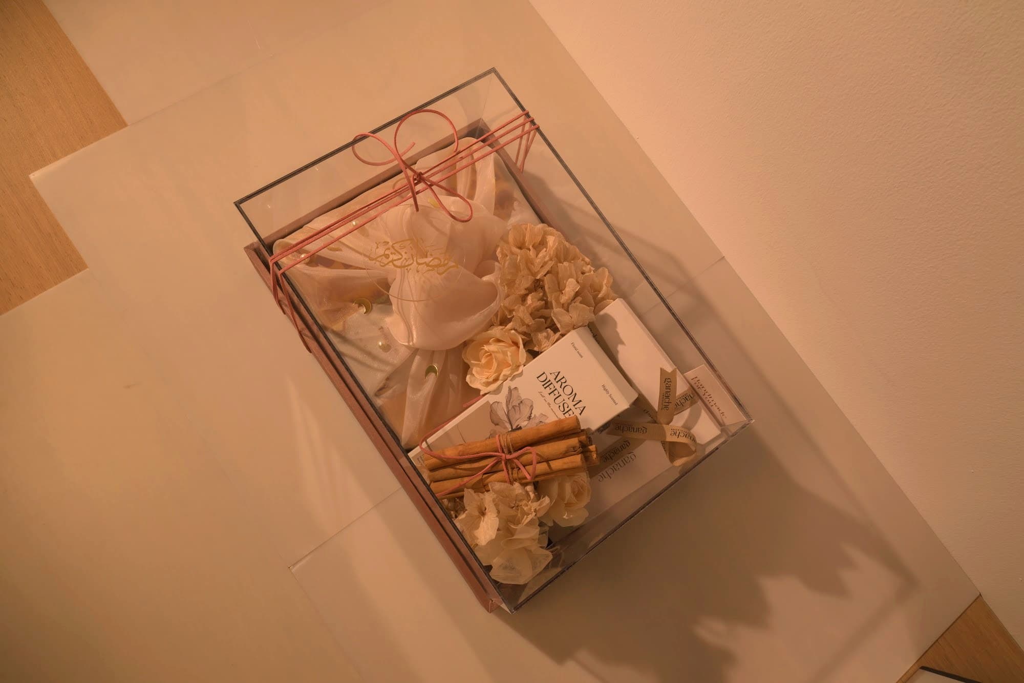 Elegant Bare & Brown gift boxes paired with a luxury diffuser in warm sand tones