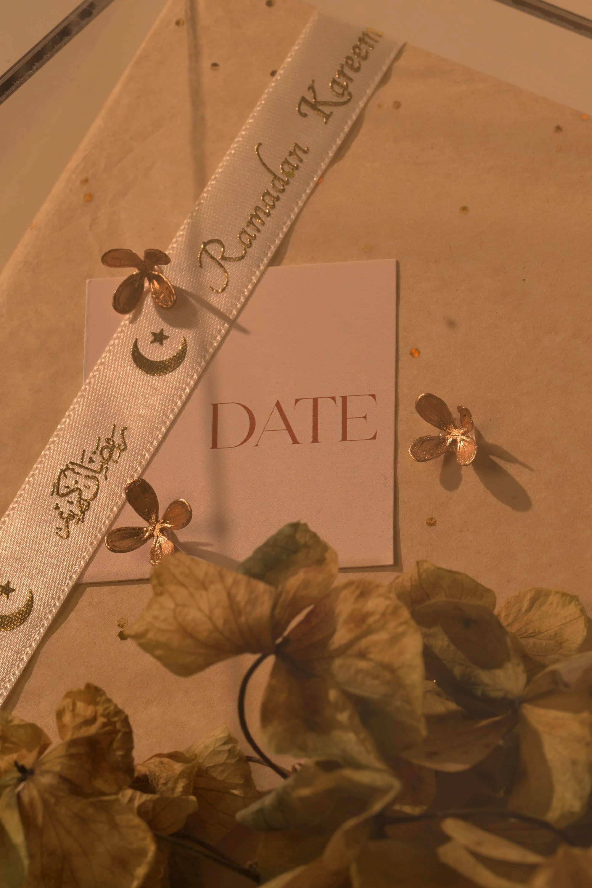 A ribbon and card detail on a finished Bare & Brown presentation
