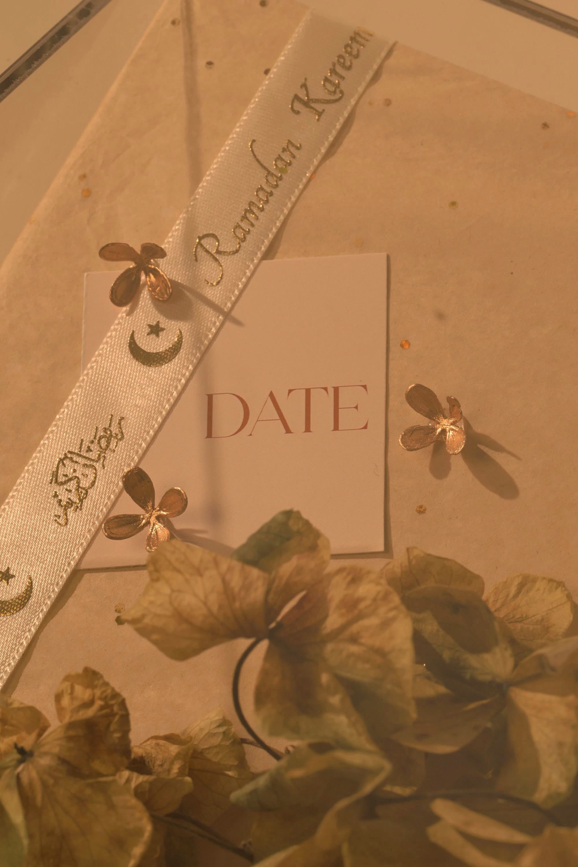 A ribbon and card detail on a finished Bare & Brown presentation