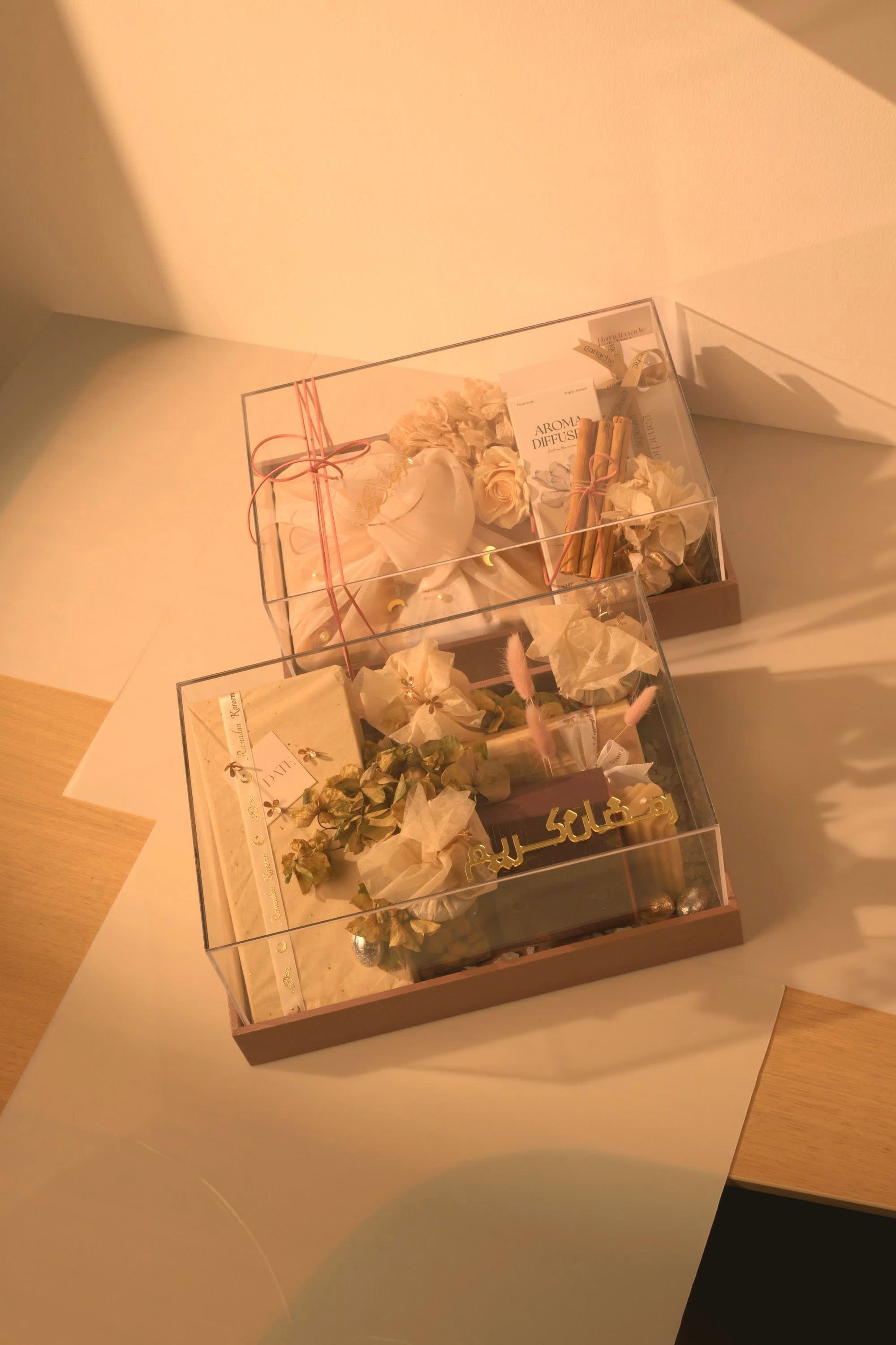 Two curated Bare & Brown gift boxes — the work of a discreet, trusted gifting house